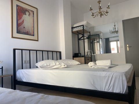 Triple Room | Pillowtop beds, in-room safe, individually decorated