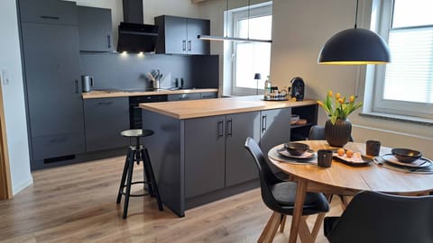 Apartment | Private kitchen | Fridge, stovetop, electric kettle, cookware/dishes/utensils