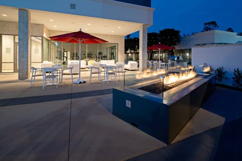 Outdoor pool, open 8:00 AM to 10:00 PM, pool umbrellas, sun loungers