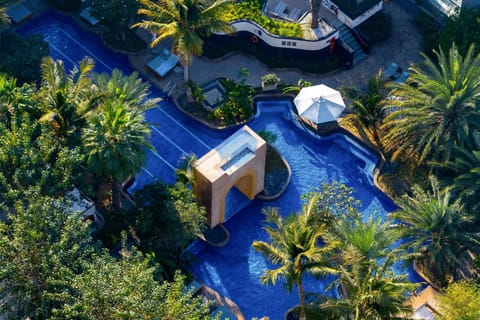 Outdoor pool, open 7:00 AM to 8:00 PM, cabanas (surcharge)