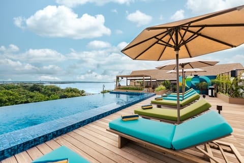 Outdoor pool, free cabanas, pool umbrellas