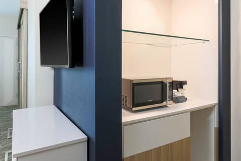 Down comforters, desk, laptop workspace, blackout drapes