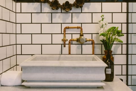 Designer toiletries, hair dryer, towels, soap