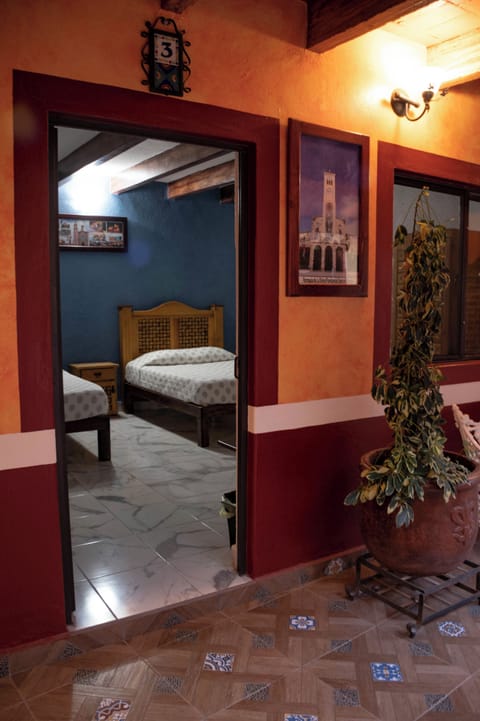 Basic Quadruple Room, 2 Queen Beds | Laptop workspace, free WiFi, bed sheets