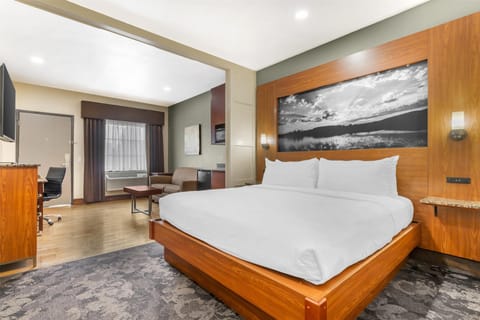 Desk, laptop workspace, blackout drapes, iron/ironing board