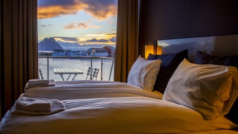 Superior Apartment, Sea View | Down comforters, blackout drapes, soundproofing, iron/ironing board