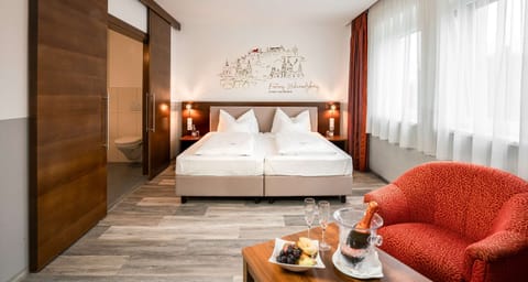 Junior Suite, 2 Twin Beds, Bathtub (Cozy Sitting Corner;Quiet Location) | In-room safe, desk, laptop workspace, blackout drapes