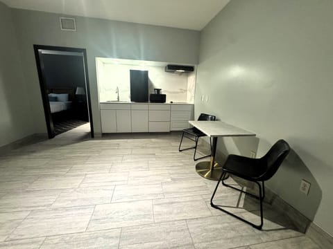 Suite, 1 King Bed, Non Smoking | In-room safe, individually decorated, individually furnished, desk