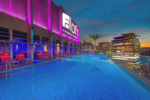 Outdoor pool, open 6:00 AM to 11:00 PM, pool umbrellas, sun loungers