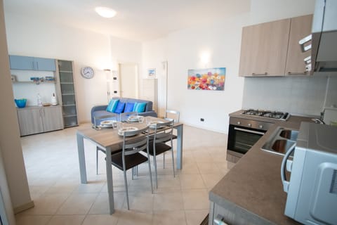 Apartment, 1 Bedroom | Living area | Flat-screen TV