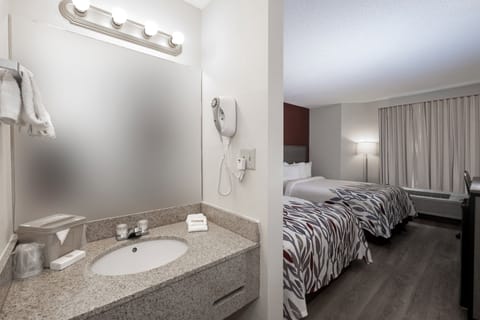 Combined shower/tub, hair dryer, towels, soap