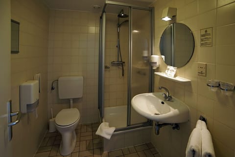 Shower, towels, soap, shampoo