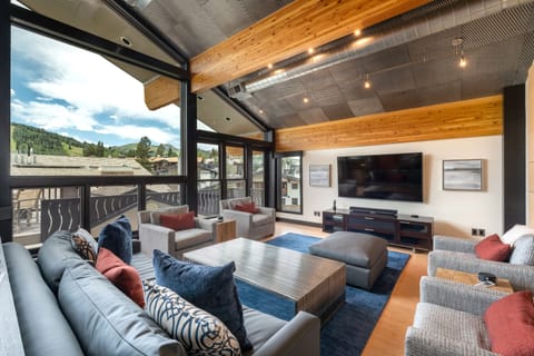 Luxury Condo | Living area | 55-inch flat-screen TV with cable channels, TV, fireplace
