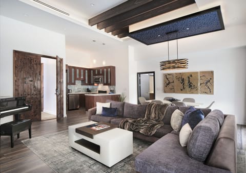 Grand Deluxe Villa | Living area | 55-inch Smart TV with cable channels, TV, pay movies