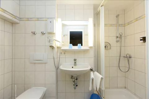 Shower, free toiletries, hair dryer, towels