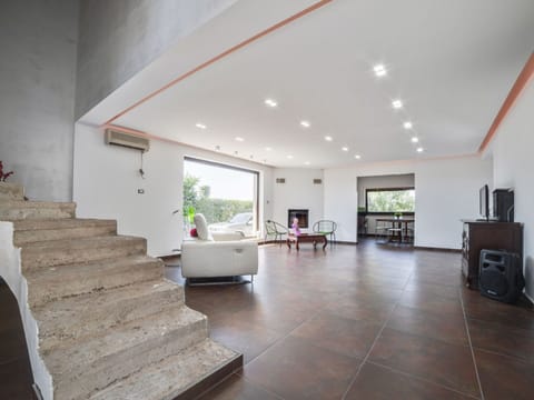 Villa | Living area | Fireplace