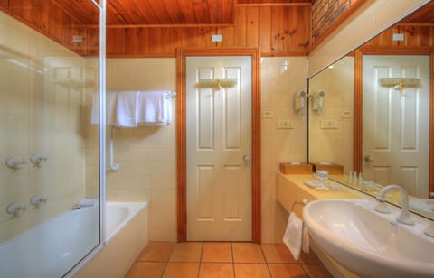 Stanley Village – Superior Suite, 1 Queen Bed, Sea View | Bathroom | Hair dryer, slippers, towels, soap