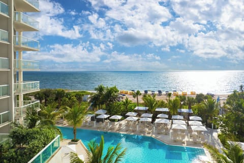 On the beach, sun loungers, beach umbrellas, beach towels