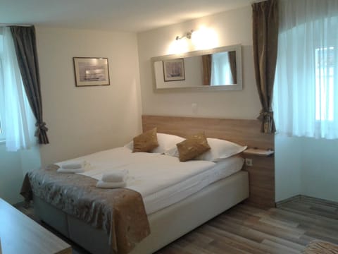 Double Room, Sea View | Down comforters, minibar, in-room safe, desk