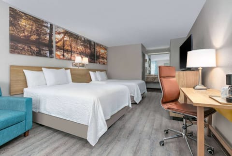 Desk, iron/ironing board, free cribs/infant beds, rollaway beds