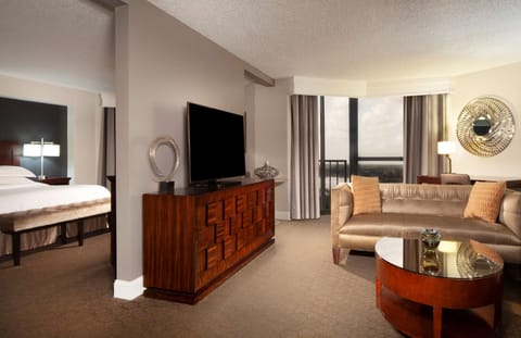 Suite, 1 Bedroom, Balcony, Pool View | Living area | 42-inch flat-screen TV with cable channels, TV