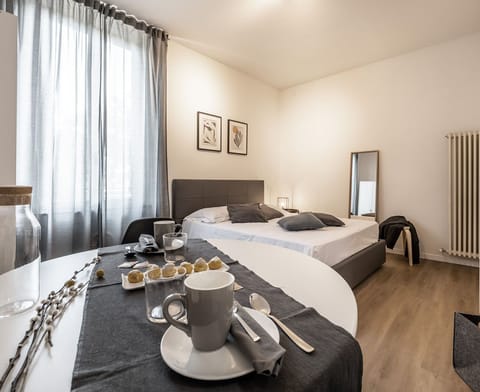 Comfort Room | Premium bedding, down comforters, iron/ironing board