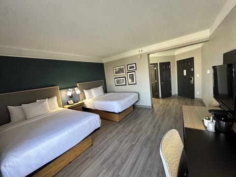 Deluxe Room, 2 Queen Beds, Non Smoking | Premium bedding, desk, laptop workspace, iron/ironing board