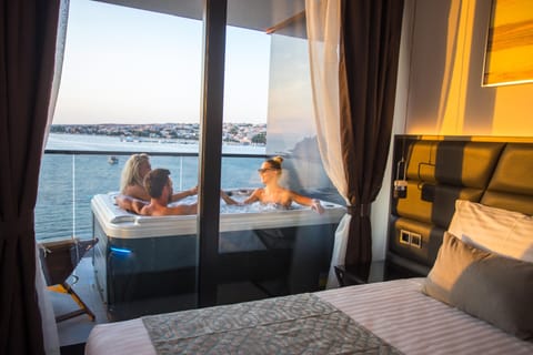 Presidential Suite, Hot Tub, Sea View | Down comforters, memory foam beds, minibar, in-room safe