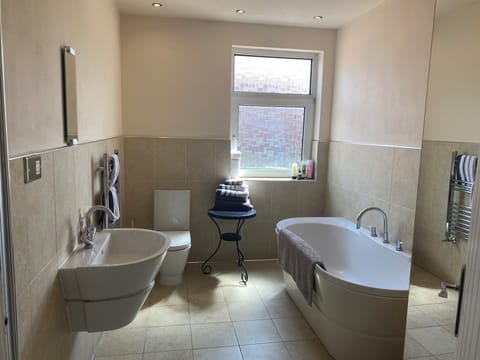 House | Bathroom | Combined shower/tub, deep soaking tub, hair dryer, towels