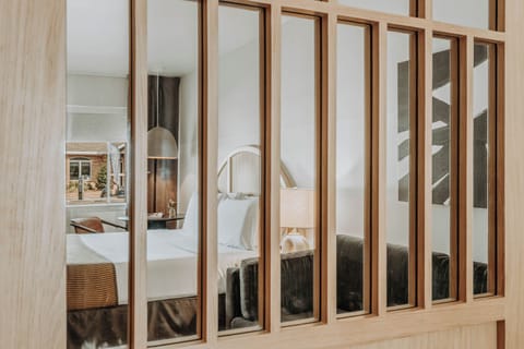 Premium bedding, memory foam beds, desk, laptop workspace