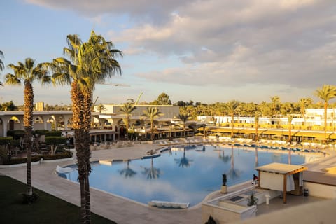 Outdoor pool, open 9:00 AM to 6:00 PM, cabanas (surcharge)