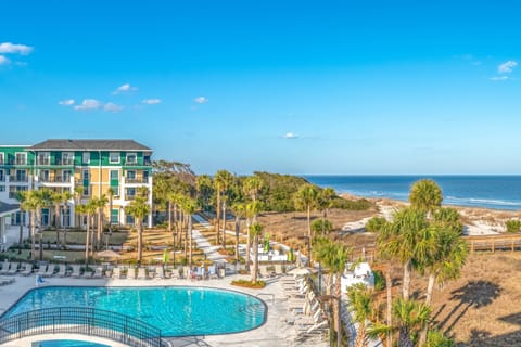 Outdoor pool, open 9:00 AM to 10:00 PM, pool umbrellas, sun loungers