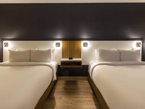 Premium bedding, pillowtop beds, desk, laptop workspace