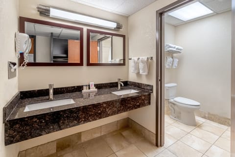Suite, 2 Queen Beds | Bathroom | Combined shower/tub, hair dryer, towels