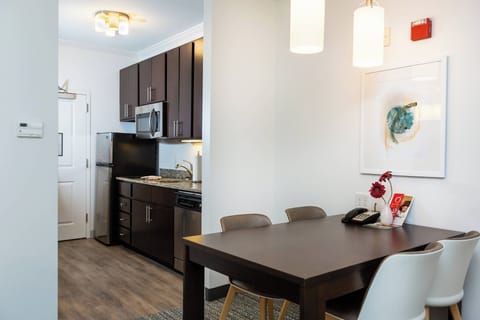 Studio, 2 Queen Beds | Private kitchen | Full-size fridge, microwave, stovetop, dishwasher