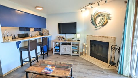 Condo | Living area | 40-inch flat-screen TV with cable channels, Smart TV, fireplace