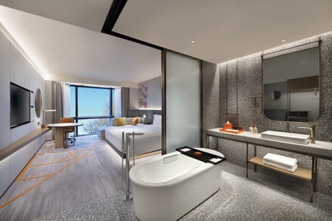 Premium bedding, down comforters, pillowtop beds, free minibar items