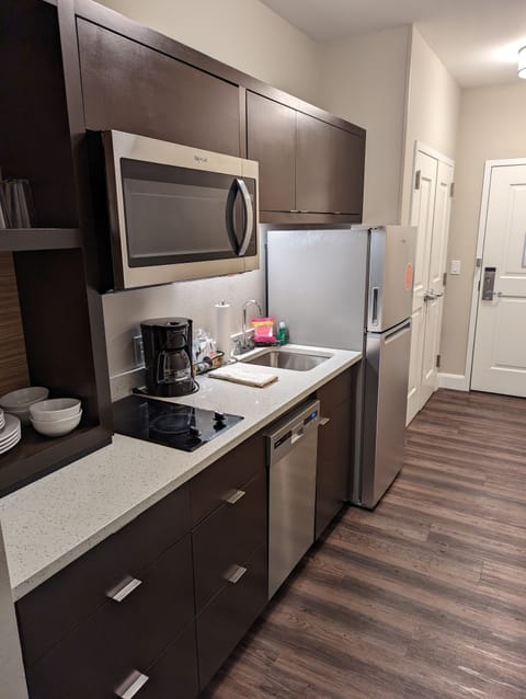 Studio, 2 Queen Beds (Hearing Accessible) | Private kitchen | Fridge, microwave, stovetop, dishwasher