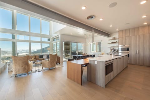 Luxury Townhome | Private kitchen | Full-size fridge, microwave, oven, stovetop