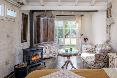 Honeymoon Suite, 1 Queen Bed, Jetted Tub, Garden Area | Egyptian cotton sheets, premium bedding, pillowtop beds, minibar