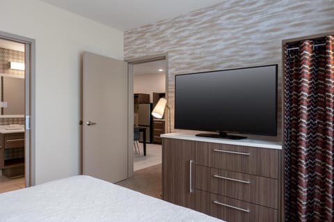 Suite, 1 Bedroom, Non Smoking | Desk, iron/ironing board, free cribs/infant beds, bed sheets