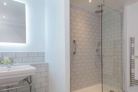 Eco-friendly toiletries, hair dryer, towels, soap