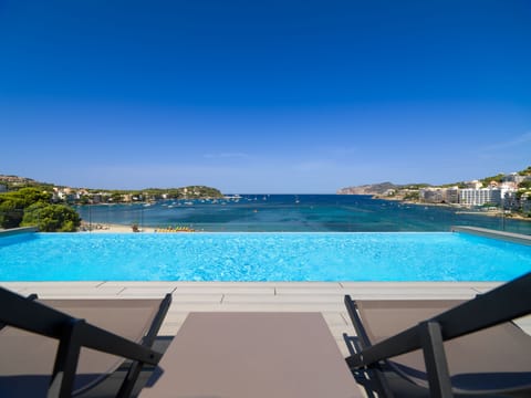 Indoor pool, 2 outdoor pools, open 10 AM to 6:30 PM, pool umbrellas