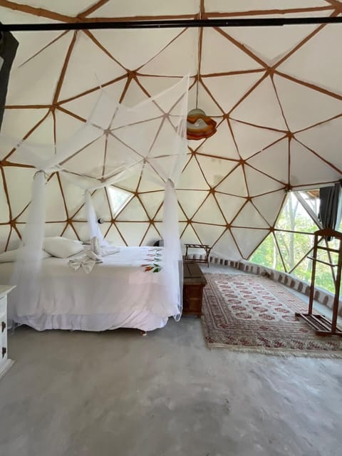 Design Tent | Premium bedding, down comforters, individually decorated, bed sheets