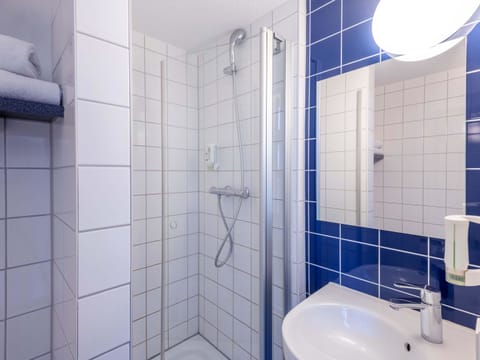 Shower, hair dryer, soap, shampoo