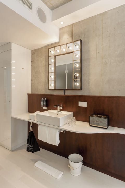 Shower, rainfall showerhead, designer toiletries, hair dryer