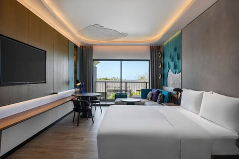 Deluxe Room, 1 King Bed with Sofa bed, Balcony | Down comforters, minibar, in-room safe, desk