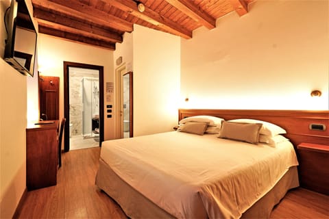 Standard Room | Down comforters, minibar, in-room safe, desk