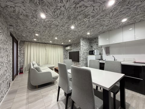 Super Suite, Non Smoking | Living area | Flat-screen TV, streaming services