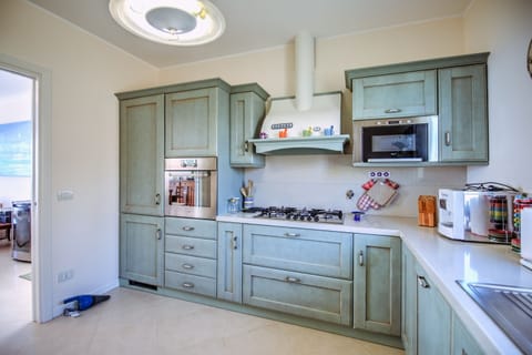 Family Villa, Multiple Bedrooms, Mountainside (Villa Lucia Riviera dei Fiori Pool) | Private kitchen | Fridge, microwave, oven, stovetop